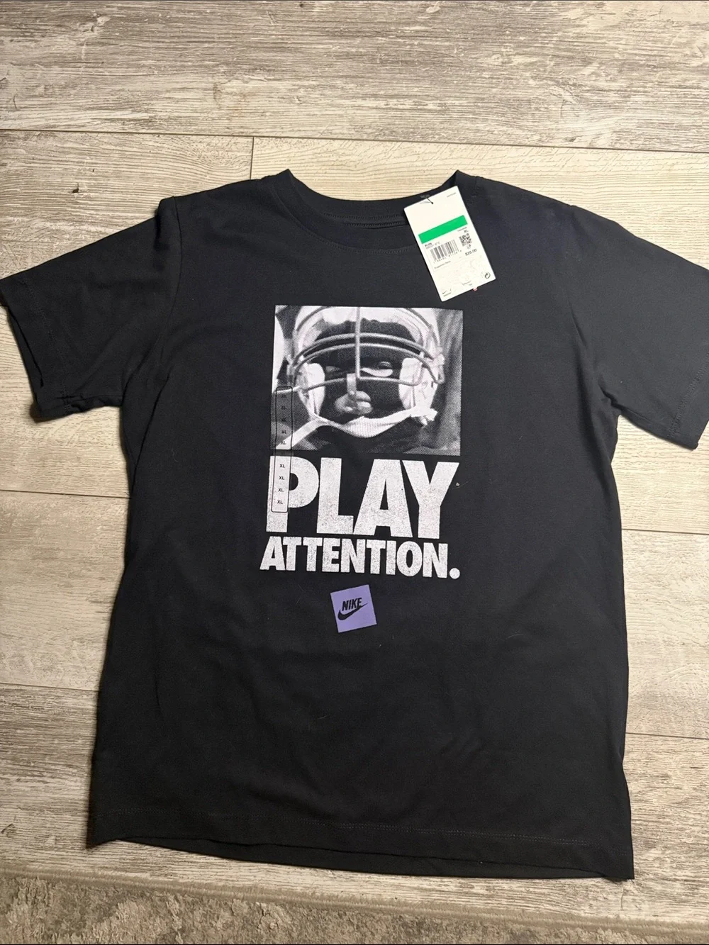 Nike Black Graphic 'Play Attention' Tee with White Print and Purple Logo